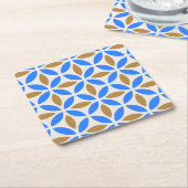 スペイン語は青および茶色の花びらのスタイルを作ります スクエアペーパーコースター (アングル)