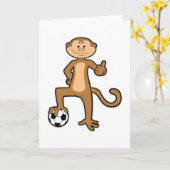 スポーツでサッカー ボールを持つ猿 カード (黄色い花)