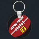 スポーツチームレッドブラックサッカーキーチェーン キーホルダー<br><div class="desc">家族や友カッコいい人への贈り物としてのカラフルスポーツテーマキーチェーン。名前と選手の番号パーソナライズされたを持つアメリカンフットボールのキーチェーン。サッカー素晴らしのコーチ、キャプテン、選手のための記念品。</div>