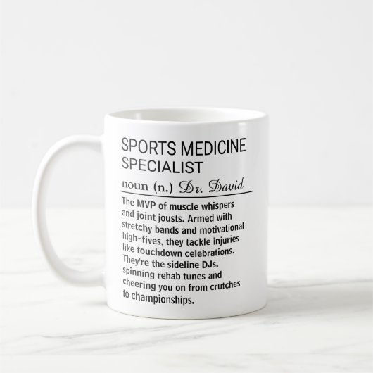 スポーツ医学スペシャリストの面白い定義 コーヒーマグカップ (左)