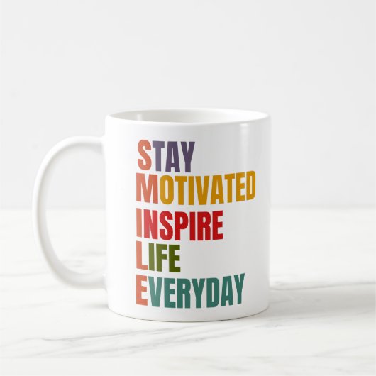 スマイルス意欲を起こテインスパイアイ毎日 コーヒーマグカップ (左)