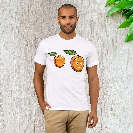 スマイル顔の幸せなアプリコットと葉 Tシャツ