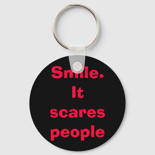 スマイル。それは人々を怖がらせる キーホルダー (正面)