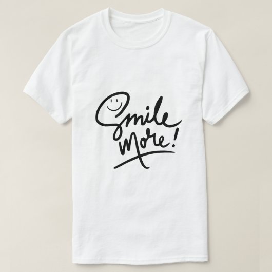 スマイル・モア - ポジティブなタイポグラフィ Tシャツ (デザイン正面)