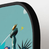 スマッシュの像 – ニューヨークのピックボールデザイン ピックルボールラケット (左詳細)