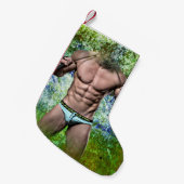 スリッピージョーの非常に筋肉質な大人男性の上半身裸の  スモールクリスマスストッキング (正面 (吊り時))