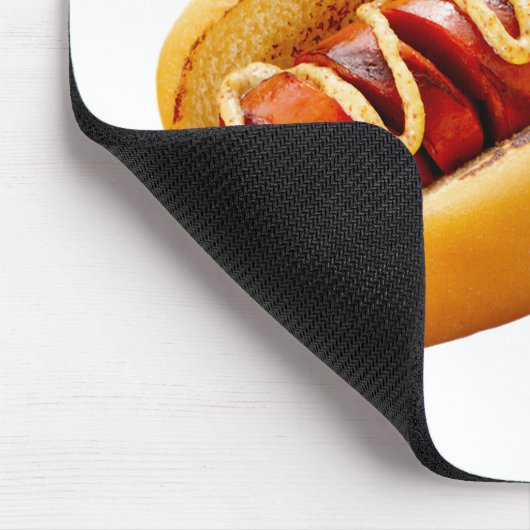 スリップリージョーのホットドッグ、柔らかなパンに収まり、鮮やかな黄色のマスタードソースがスパイラルに マウスパッド (コーナー)