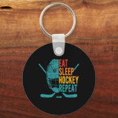 スリープホッケー食べリピートおもしろいアイスホッケー キーホルダー (正面)