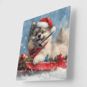 スレッジに乗ったケースホンド犬 Let it Snow クリスマス スクエア壁時計 (傾斜)