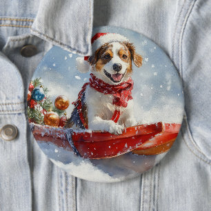 スレッドに乗ったブリタニースパニエル犬 クリスマス 缶バッジ