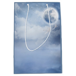 スワンズの幻想的な青飛んでいる空 ミディアムペーパーバッグ