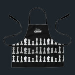 スーシェフチェス駒白黒キッズ エプロン<br><div class="desc">チェックラシックス愛好家のための黒と白のチェスの子供のエプロン，幾何学的なパターンでチェスの姿をフィーチャー。チェスモダン駒デザイン</div>