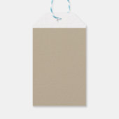 スーツを着て壁の前に立っている男性 ギフトタグ (裏面)