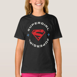 スーパーガールエイジの英雄サークルSシールド Tシャツ