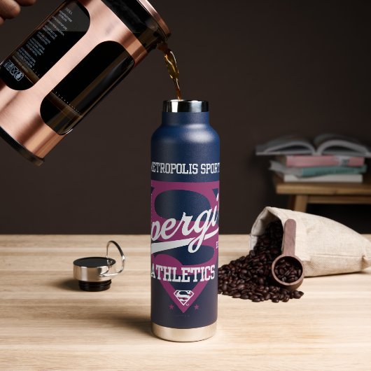スーパーガールメトロポリススポーツ陸上競技グラフィック ウォーターボトル (コーヒー)