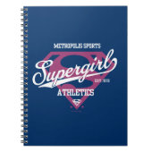 スーパーガールメトロポリススポーツ陸上競技グラフィック ノートブック (正面)