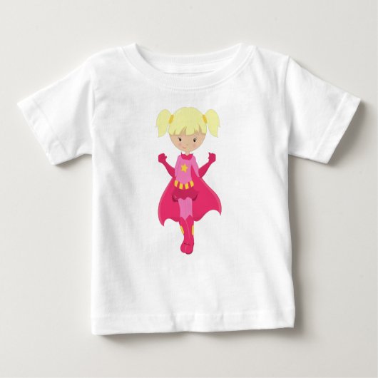 スーパーガール, ブロンドの髪, ピンクのマント, かわいい女の子 ベビーTシャツ (正面)