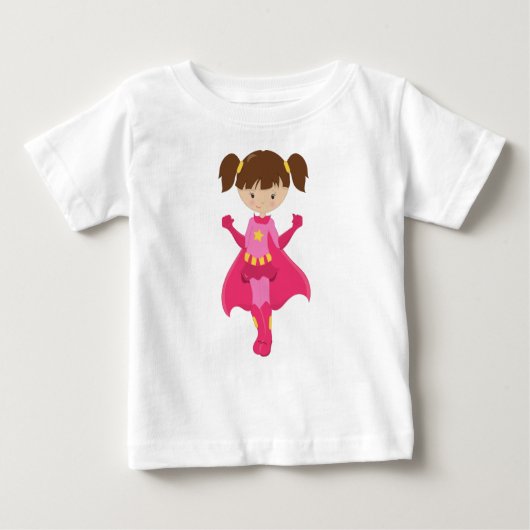 スーパーガール、茶色の髪、ピンクのマント、かわいい女の子 ベビーTシャツ (正面)