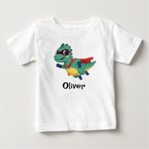 スーパーダイノヒーロー - マントを着けたかわいい空飛ぶティラノサウルス ベビーTシャツ
