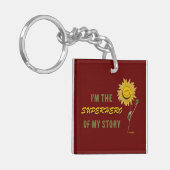 スーパーヒーローレッドキーチェーンby詩人Adiela Akoo キーホルダー (正面左)