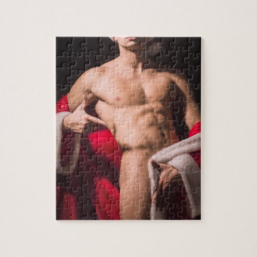 セクシーなシルエットのサンタ服を着た男 ジグソーパズル (縦)