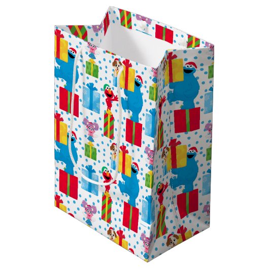 セサミストリートクリスマスプレゼントパターン ミディアムペーパーバッグ (正面アングル)
