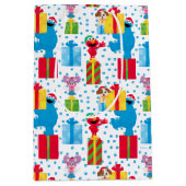 セサミストリートクリスマスプレゼントパターン ミディアムペーパーバッグ (正面)
