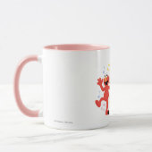 セサミストリート |ジュリア、エルモ&アビー踊り マグカップ (左)