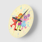セサミストリート |ジュリア、エルモ&アビー踊り ラウンド壁時計 (傾斜)