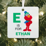 セサミストリート | Winter Elmo メタルオーナメント<br><div class="desc">エルモ&タンゴ主演のくるみ割り |このおもしろいグラフィックは、Elmoが冬の帽子とスカーフを着用してポーズを設定する。</div>