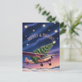 セスナ機がクリスマスツリーを運ぶ 写真 ユーモア ポストカード (スタンド正面)
