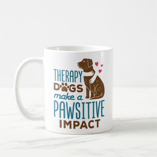 セラピー犬が手を焼くような衝撃を与える コーヒーマグカップ (左)