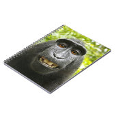 セレベス島の微笑の頂点に達されたマカク属 ノートブック (左側)