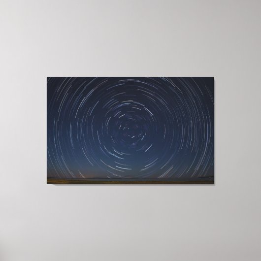 セント・イグナスのヒューロン湖の上の星のトレイル キャンバスプリント (正面)