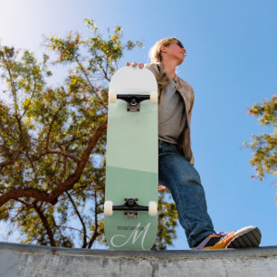 セージ緑トーンの幾何学的パターン スケートボード