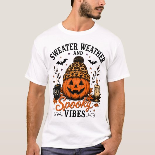 セーターの気候とスプーキーな雰囲気のハロウィンTシャツ Tシャツ (正面)