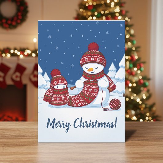 セーター編みをする雪だるまのクリスマス マフラー シーズンカード