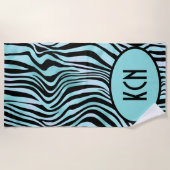 ゼブラモノグラムのプリントブラックとティール(緑がかった色)ターコイズ ビーチタオル (正面)