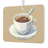 ソーサー付きの白いコーヒーカップにコーヒーを注いだ様子 カーエアーフレッシュナー (左)