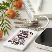 ソーシャル分散の専門家ゲームデザイン キーホルダー (正面右)