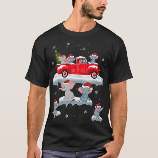 ゾウが運転するクリスマスツリー赤いトラックの象 Tシャツ (正面)