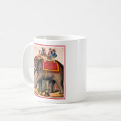 ゾウとサーカスの演技をする男性。 コーヒーマグカップ (正面左)