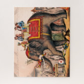 ゾウとサーカスの演技をする男性。 ジグソーパズル (縦)