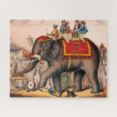 ゾウとサーカスの演技をする男性。 ジグソーパズル (横)