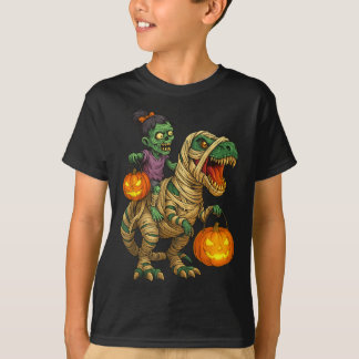 ゾンビ娘がミイラのティラノサウルスにまたがるハロウィンキッズ用トリック Tシャツ
