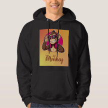 タイトル: ファンキーなキャラクタモンキーのグラフィックTシャツ