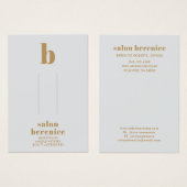 タイポグラフィはっきりした金ゴールドモノグラムヘアクリップの表示 (正面&裏面)