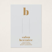 タイポグラフィはっきりした金ゴールドモノグラムヘアクリップの表示 (正面)