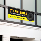 タイヤの販売バナー 横断幕 (ビルの外側)