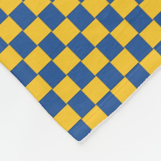 タイルを張られた編まれた青および黄色 フリースブランケット (角)